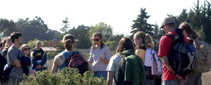 Professer Holl in the field with her class